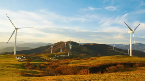 风车 丘陵 日落 草原 12k风景壁纸 MACGF.COM - macGF